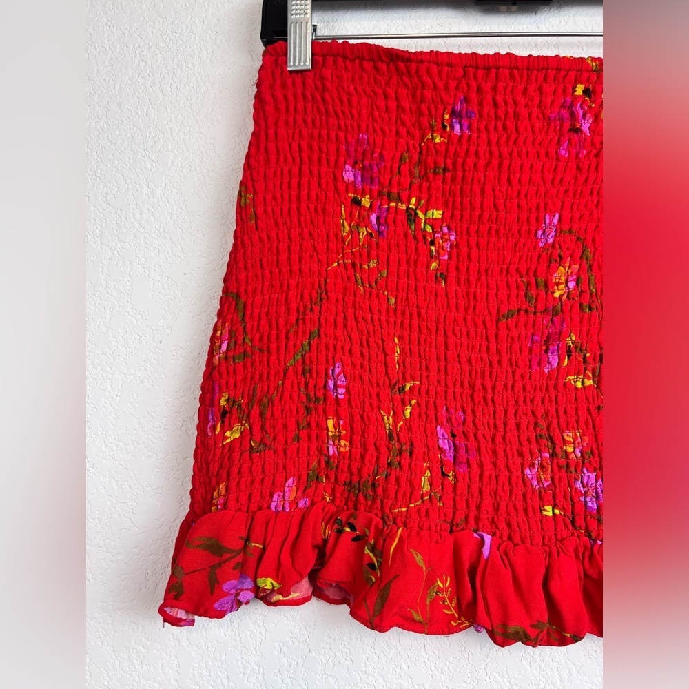 Lovers + Friends Red Floral Smocked Mini Skirt with Ruffle Hem Large - Picture 2 of 8